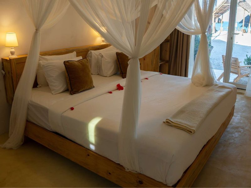 Habitación en la playa con vistas al mar - Estancia de lujo ecológico en Cristal Resort, Zanzíbar 4 5